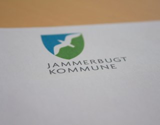 Logo Jammerbugt Kommune på papir