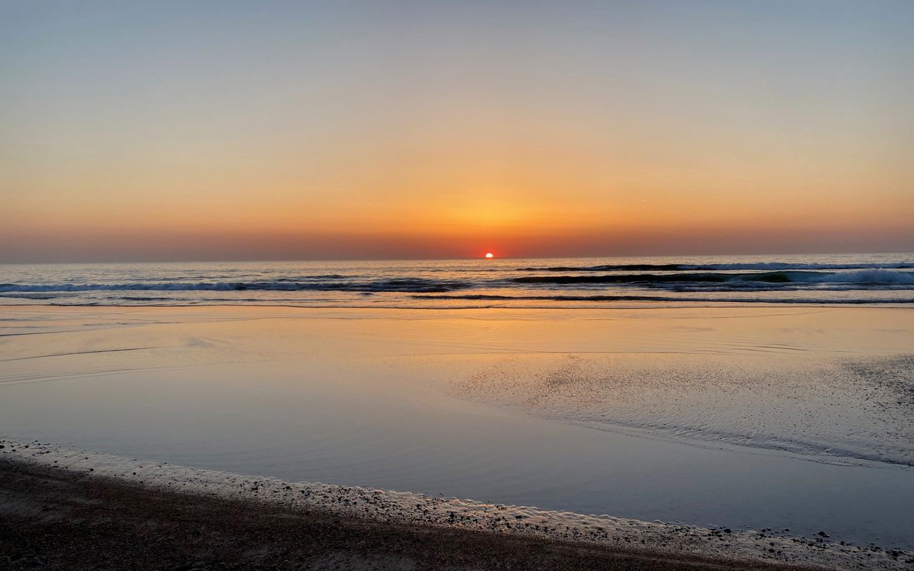solnedgang over strand