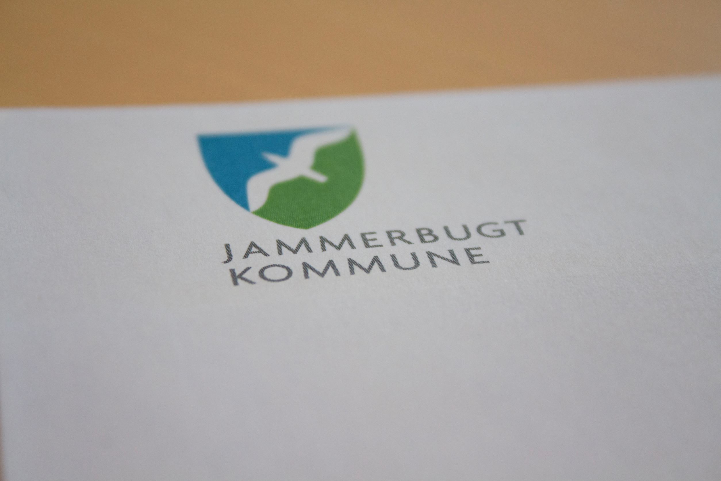 Logo Jammerbugt Kommune på papir
