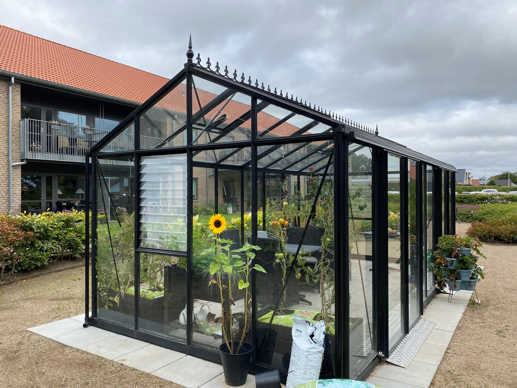 Drivhus med opholdsplads