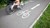 Cykelsti og cyklist der kører hurtigt