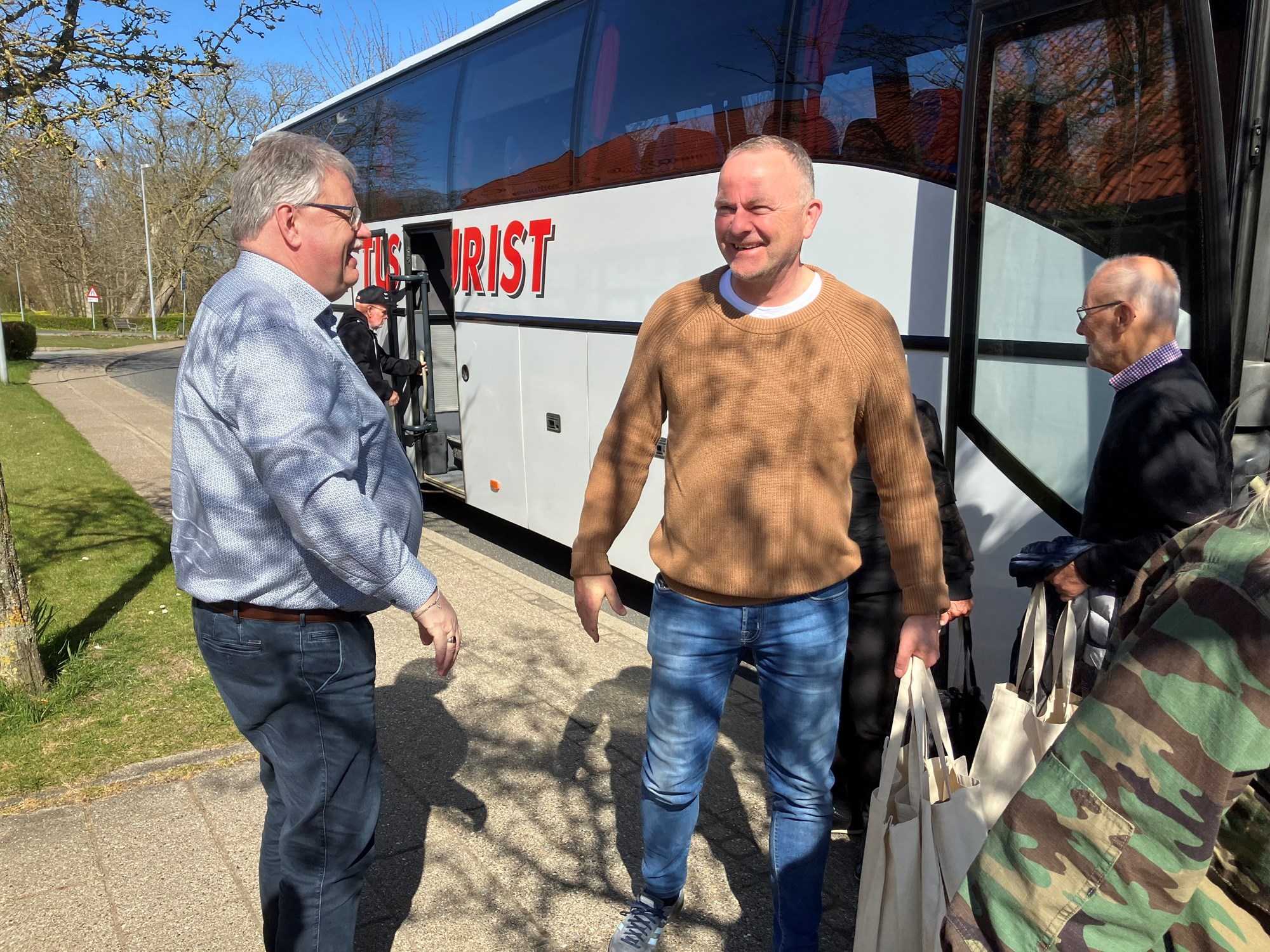 Kommune-tilflyttere på guidet bustur