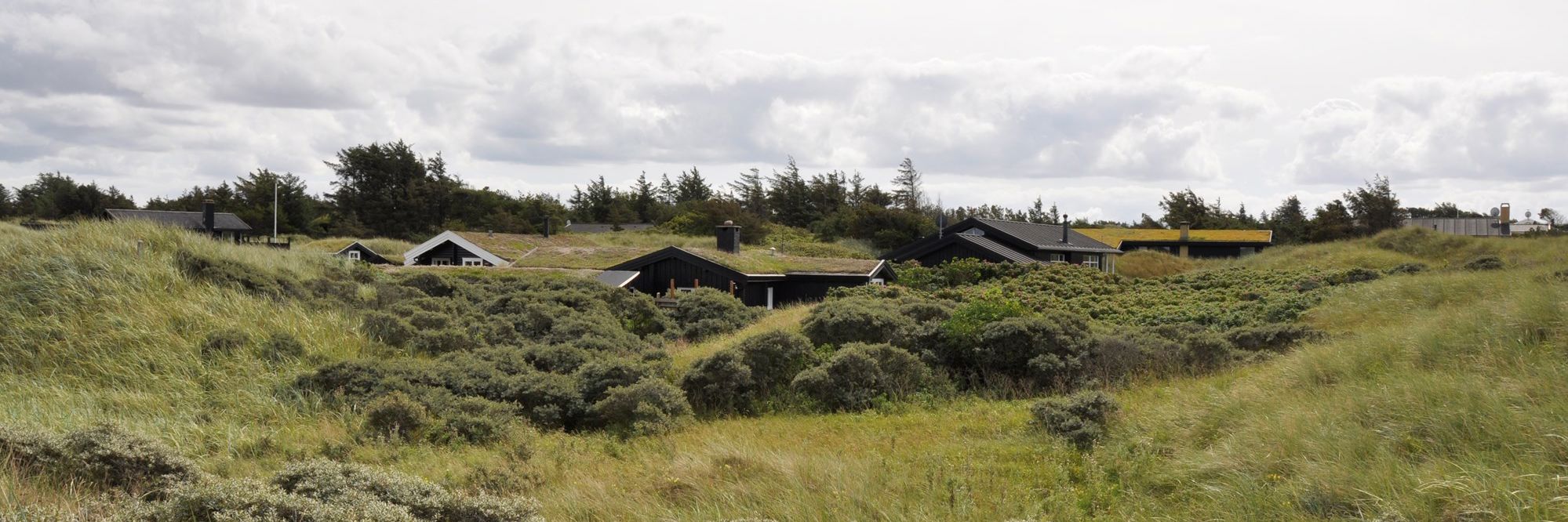 sommerhus gemt i klitter