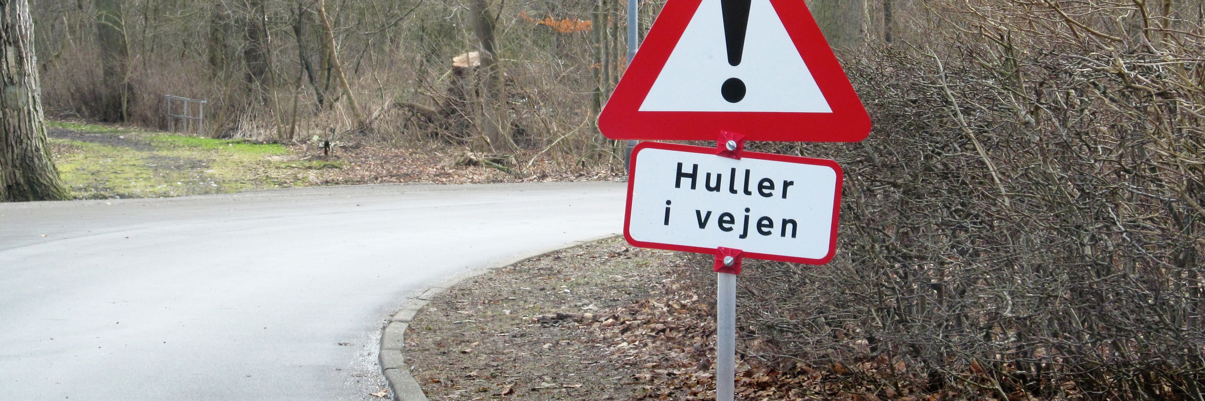 vejskilt huller i vejen